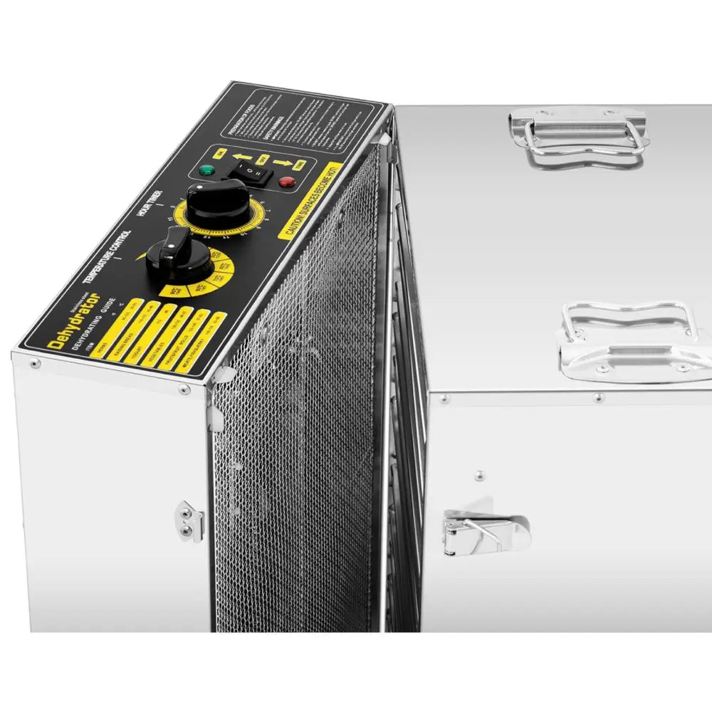 Industriell mat dehydrator, toppvisning av kontrollpanel med dreieknapper, indikatorlys og gule instruksjoner.