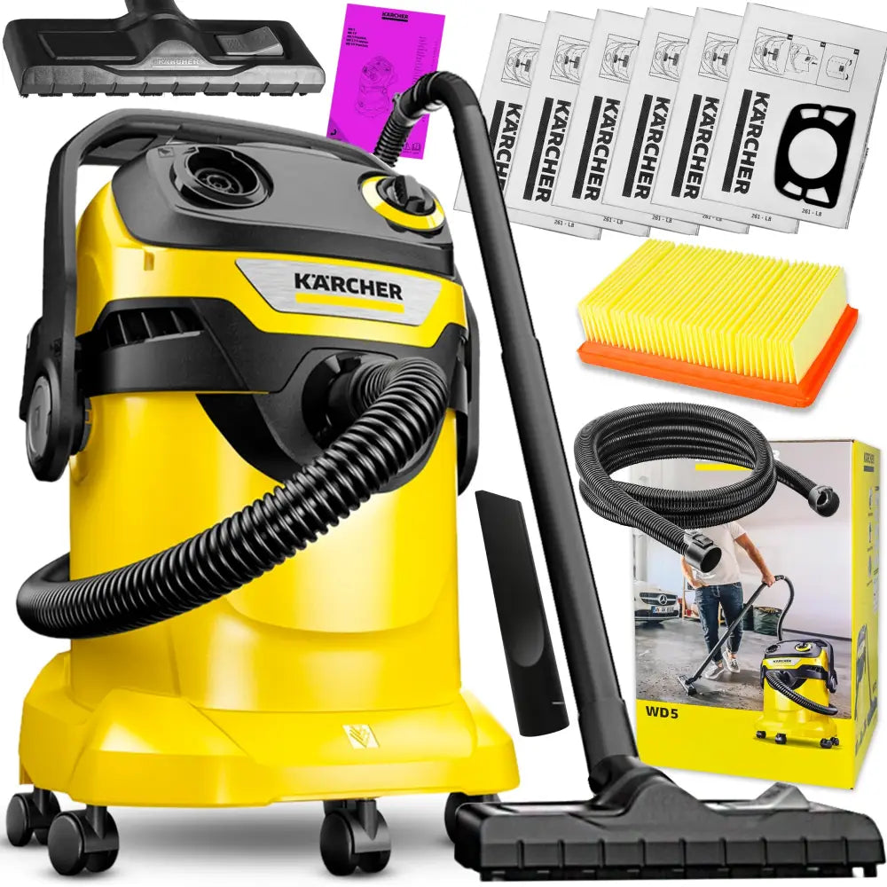 Industriell støvsuger fra Karcher med gul og svart design, slanger, poser, filter og bruksanvisning foran enheten.