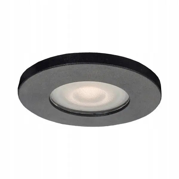 Innfelt, rund svart spotlys med matt glass og synlig lysspredning, sett fra skrå vinkel.