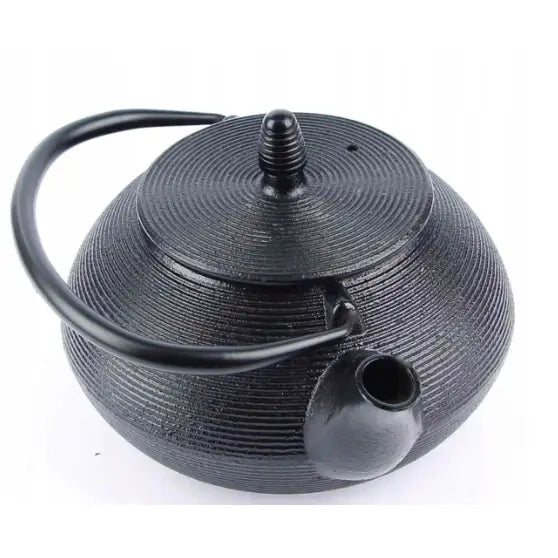 Japansk stil støpejern tekanne 800ml, sett ovenfra med sirkelmønster, riflet lokk og buet håndtak.