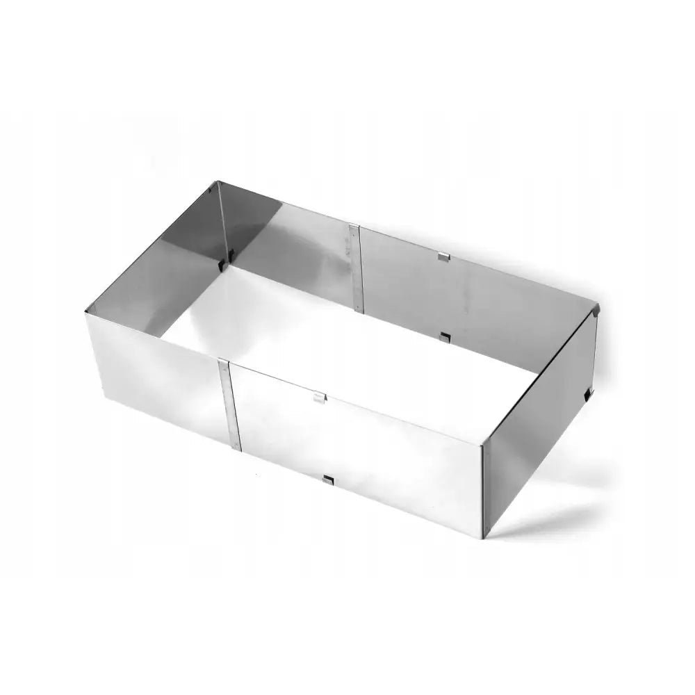 Justerbar kakering i blankt metall, rund modell vist fra skrå vinkel med glatte, rette kanter.