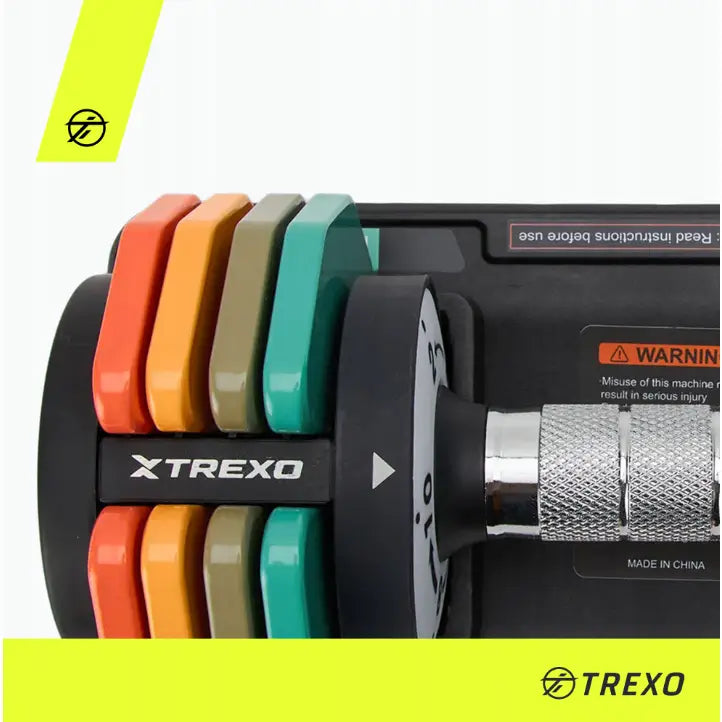 Justerbar manual fra Trexo, sidevisning med fargerike vektskiver og teksturert metallgrep med XTREXO-logo.