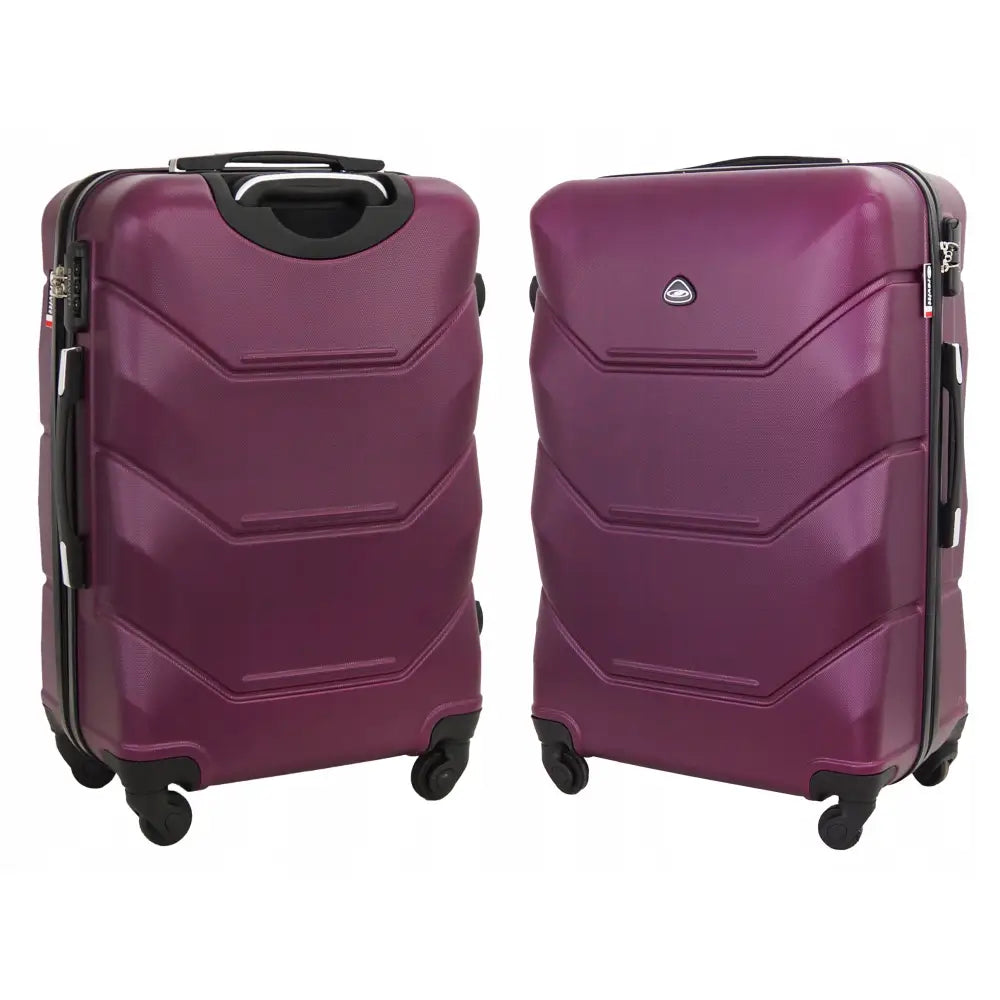 Kabinstørrelse lilla Gravitt reisekoffert med strukturert skall, fire hjul og sort teleskophåndtak.