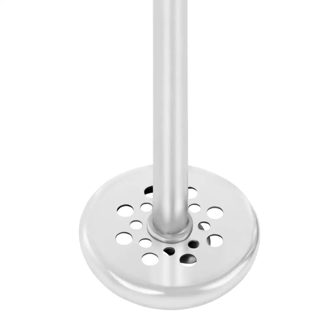 Kaffetrakter, nærbilde av rund filterplate i blankt rustfritt stål med sentralt stålrør og varierende hullstørrelser.