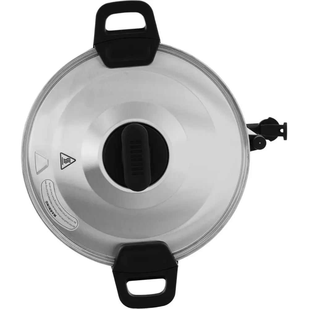 Kaffetrakter og tekoker, detaljvisning av sølvfarget lokk med svarte håndtak, grep og varselsymboler.