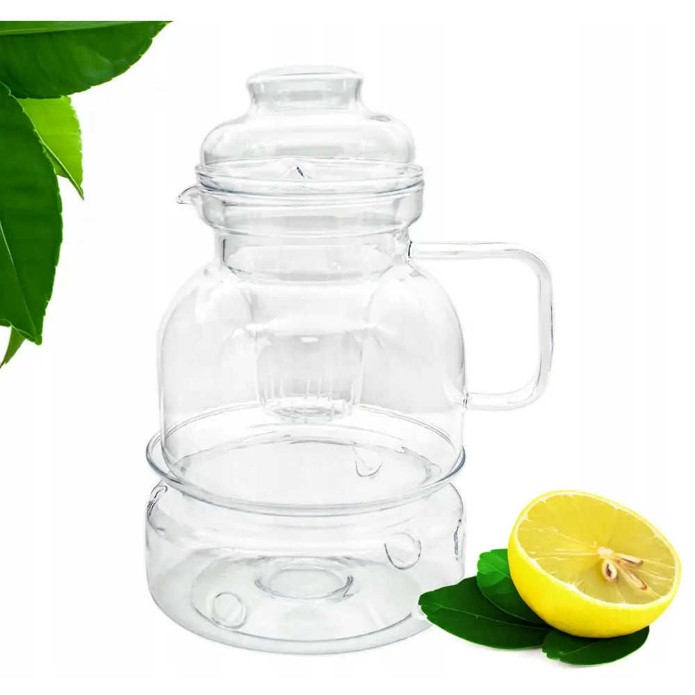 Kanne med tesil i varmebestandig glass, 1,5 L, sidevisning med halv sitron og grønne blader ved siden av.