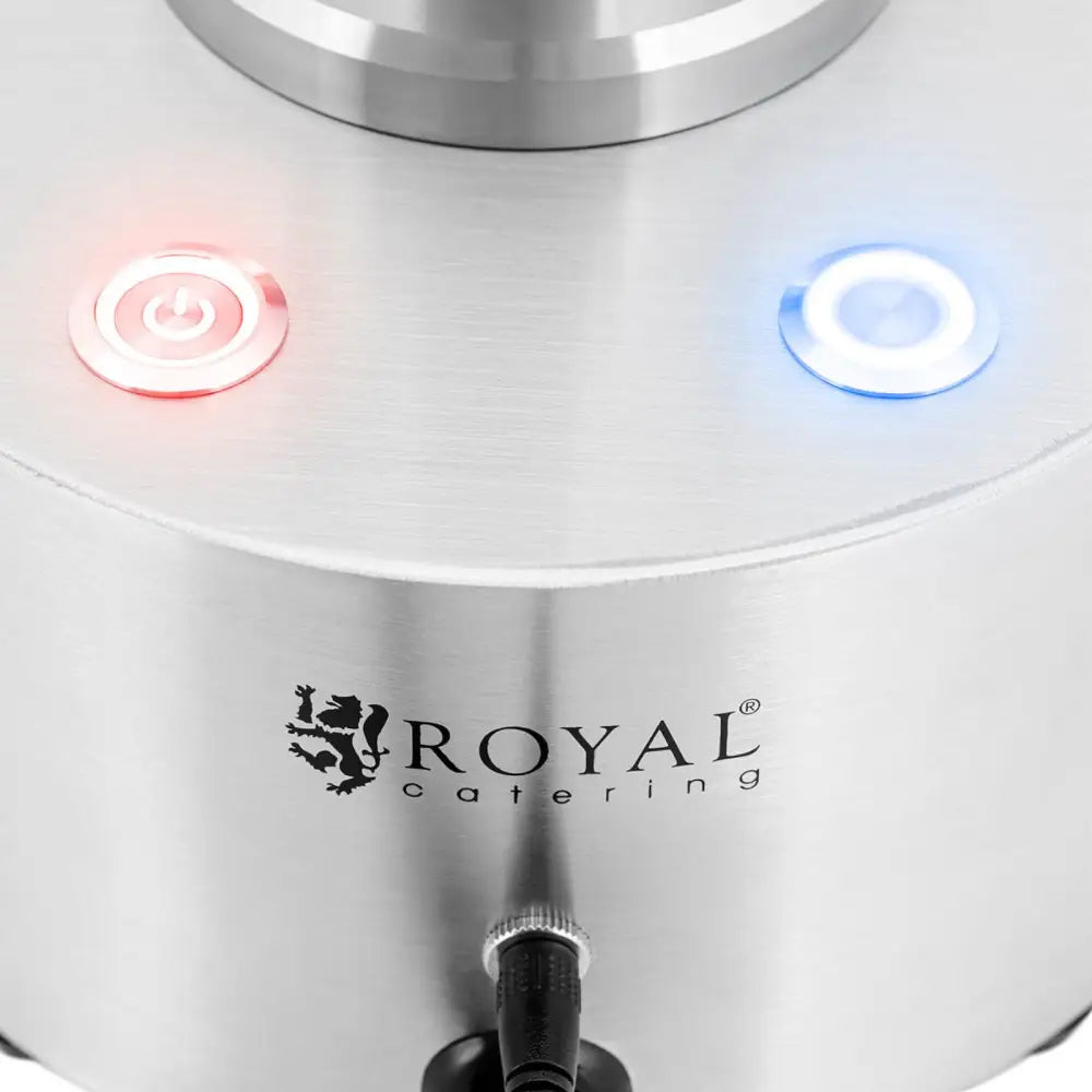 Karbonholdig ismaskin, nærbilde av opplyste røde og blå knapper, sort kabel og ROYAL catering-logo på metall.