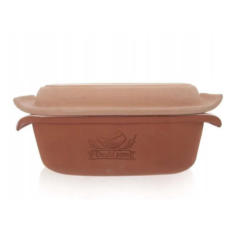 Keramisk brødform med lokk, sett fra siden, viser inngravert motiv og brede kanter på terrakotta-lokket.