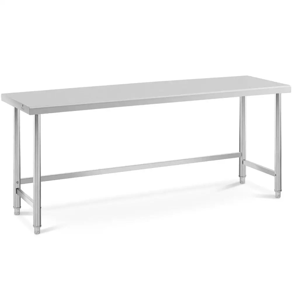 Kjøkkenbord i rustfritt stål, rektangulær form sett fra skrå vinkel med rette ben og minimalistisk design.