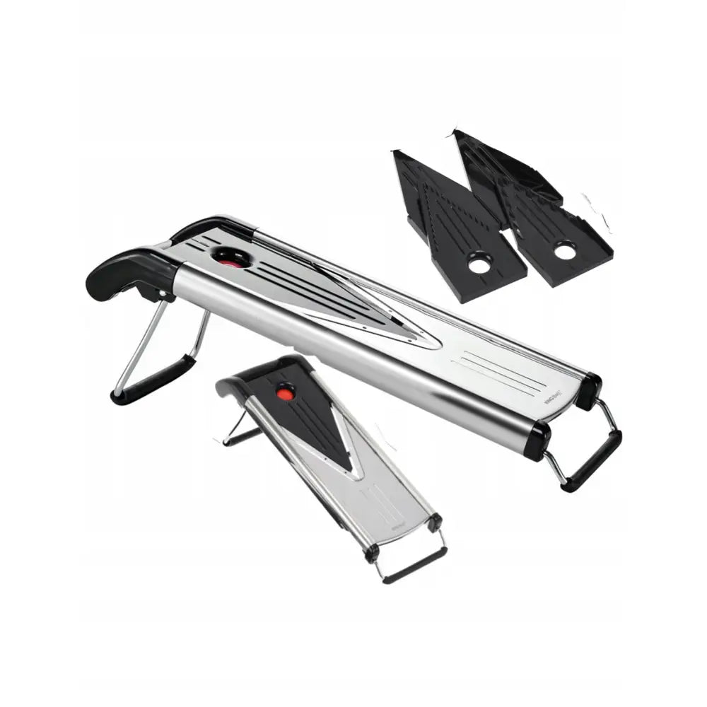 Kjøkkenhakker med sølvfarget metallkropp, sorte håndtak og bein, to sorte utskiftbare skjæreblader ved siden av.