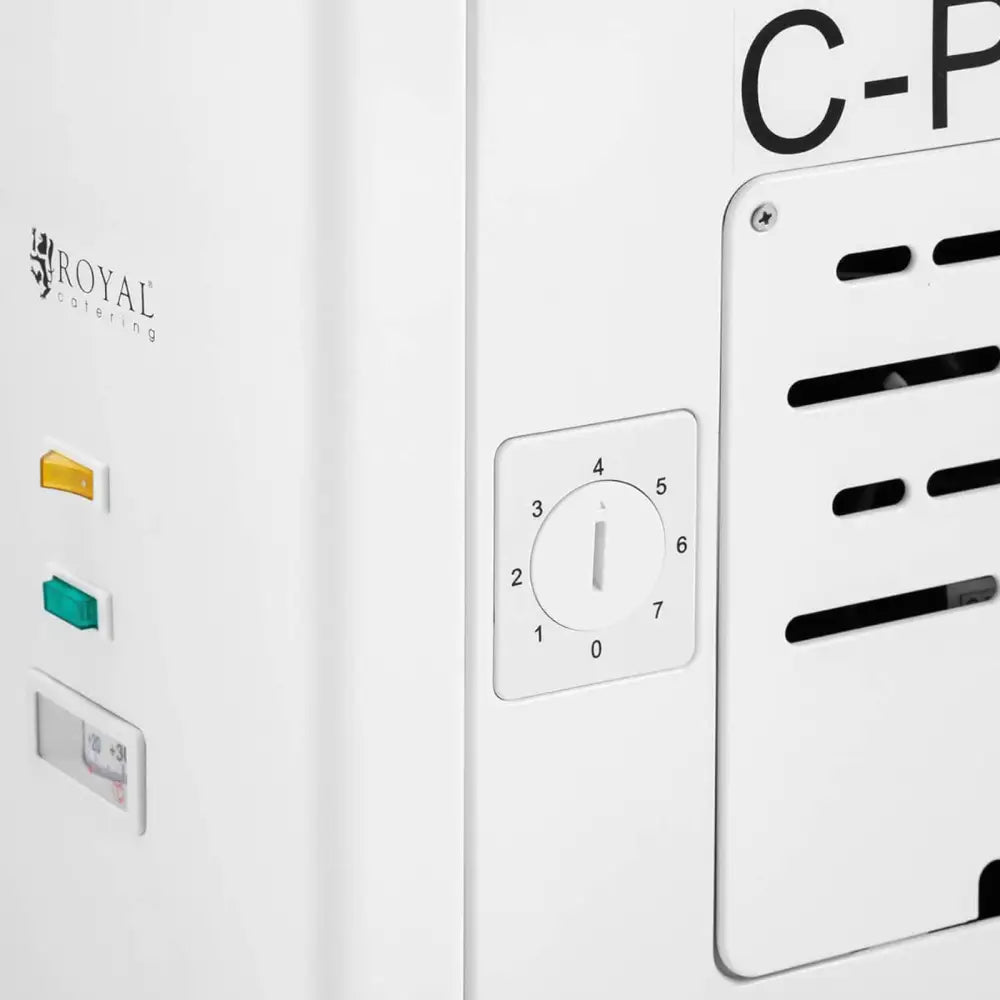 Kjøleskap skapfryser fra Royal Catering, nærbilde av justeringsratt, gule og grønne lysindikatorer.
