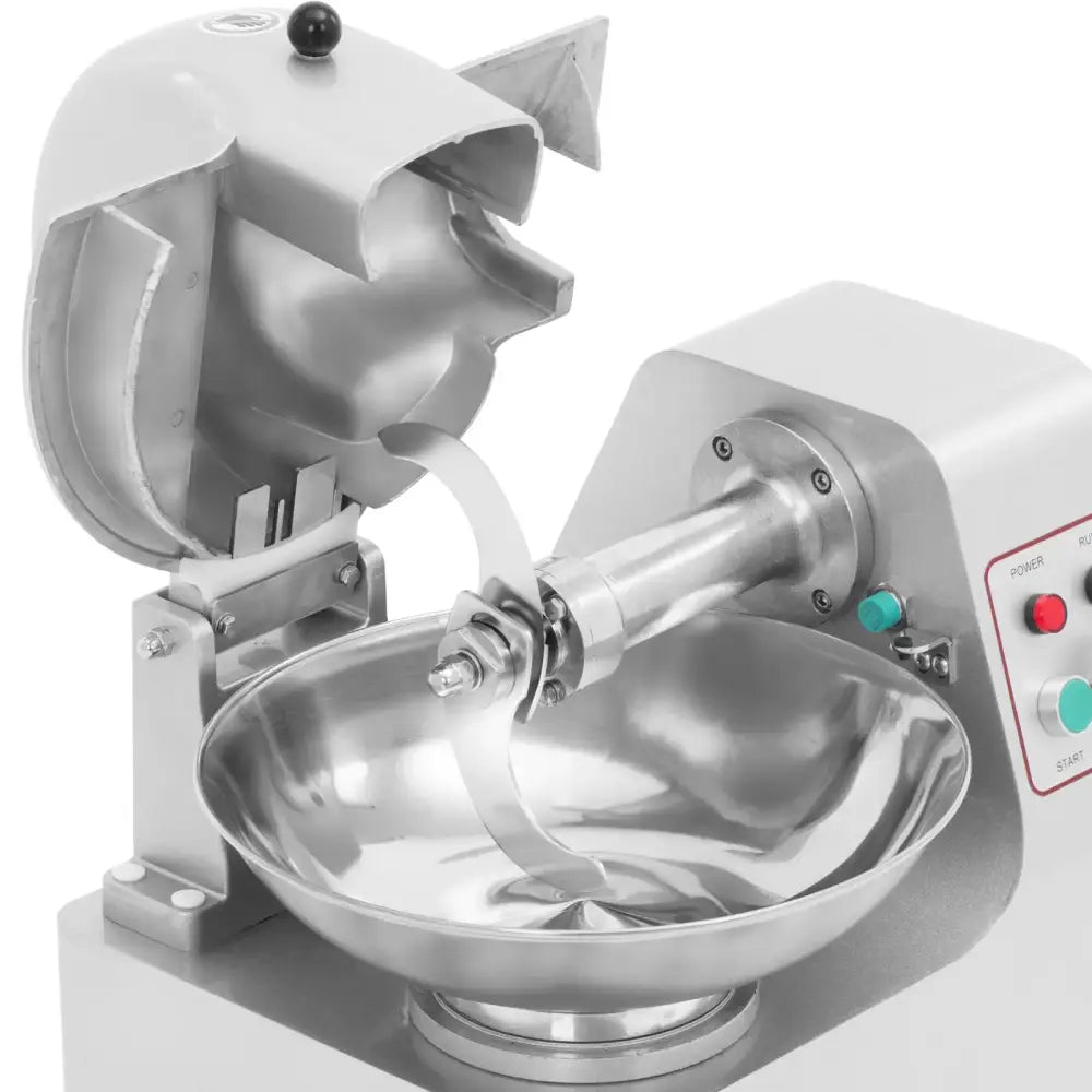 Kjøttkvern med horisontale kniver, nærbilde av åpent lokk, synlig kutteblad og betjeningspanel.