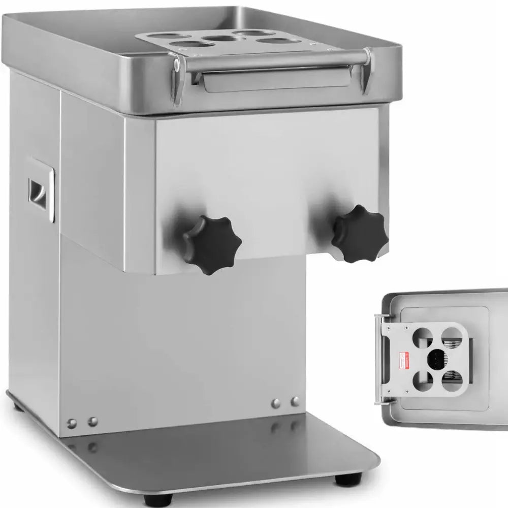 Kjøttpresse i sølvfarget metall, skrå frontvisning med sorte dreieknapper og løst lokk med håndtak og åpninger.