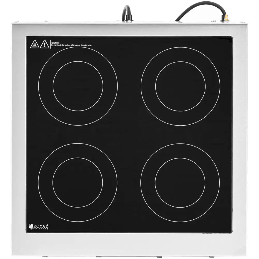 Koketopp med fire induksjonssoner, sett ovenfra med synlig ledning og ramme i rustfritt stål.