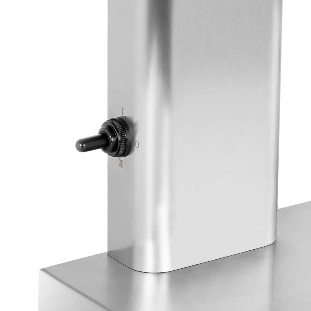 Kokteyler shaker mikser, detalj av svart vippebryter med tre valg på blank metalloverflate.
