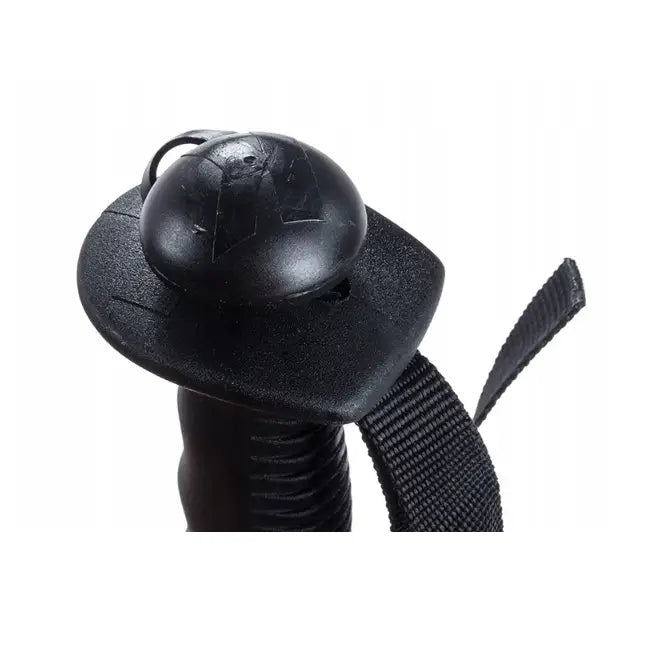 Komperdell Schnapsstock skistav, detaljert nærbilde av sort plastknott med håndreim og strukturert overflate.