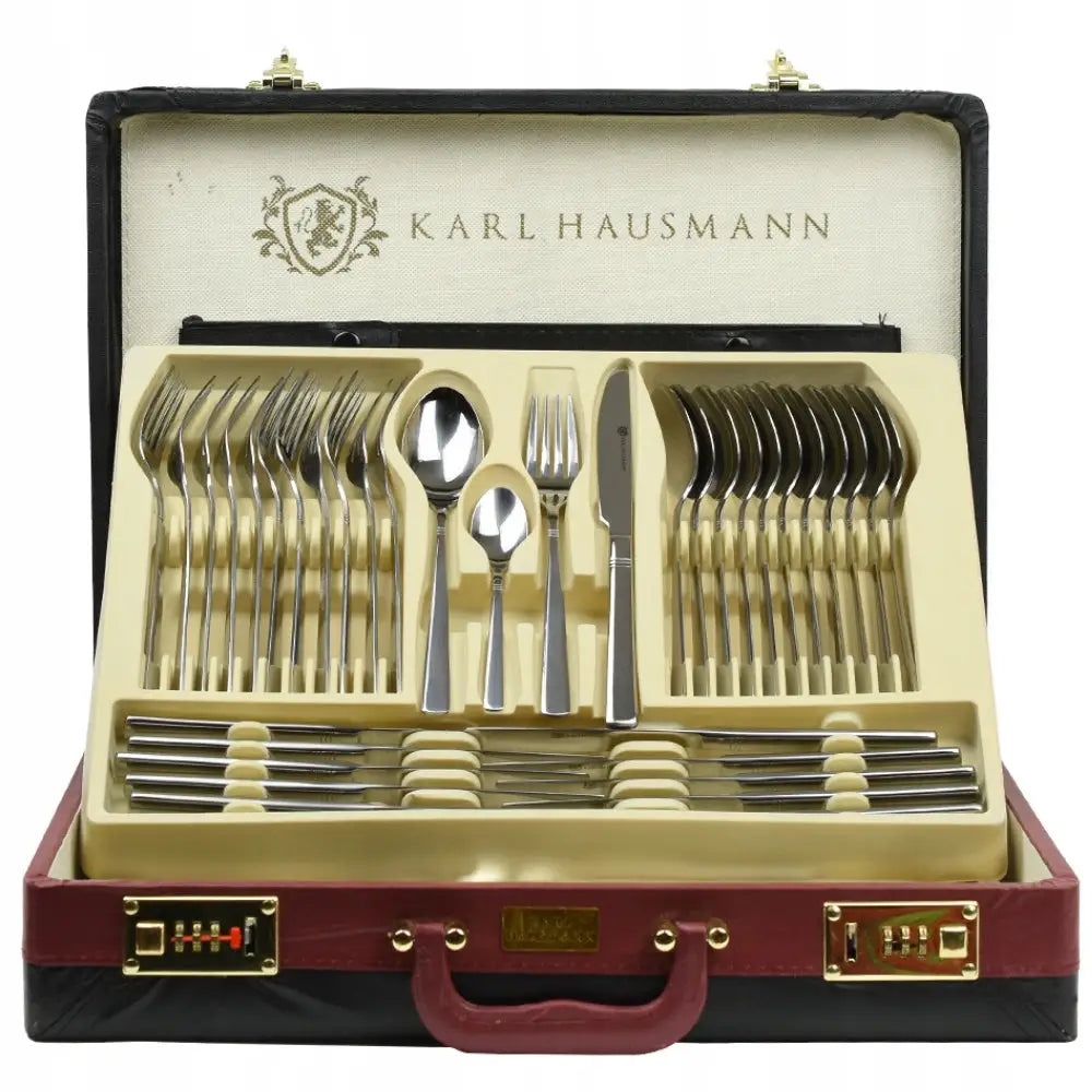 Komplett bestikksett med 72 blanke sølvfargede deler, ryddig plassert i beige koffertinnsats med rød kant.