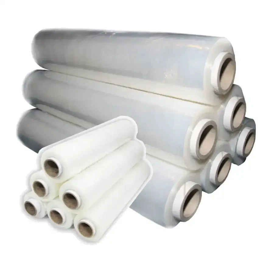 Flere gjennomsiktige plastfilm-ruller i ulike størrelser, stablet side om side med synlige ender.