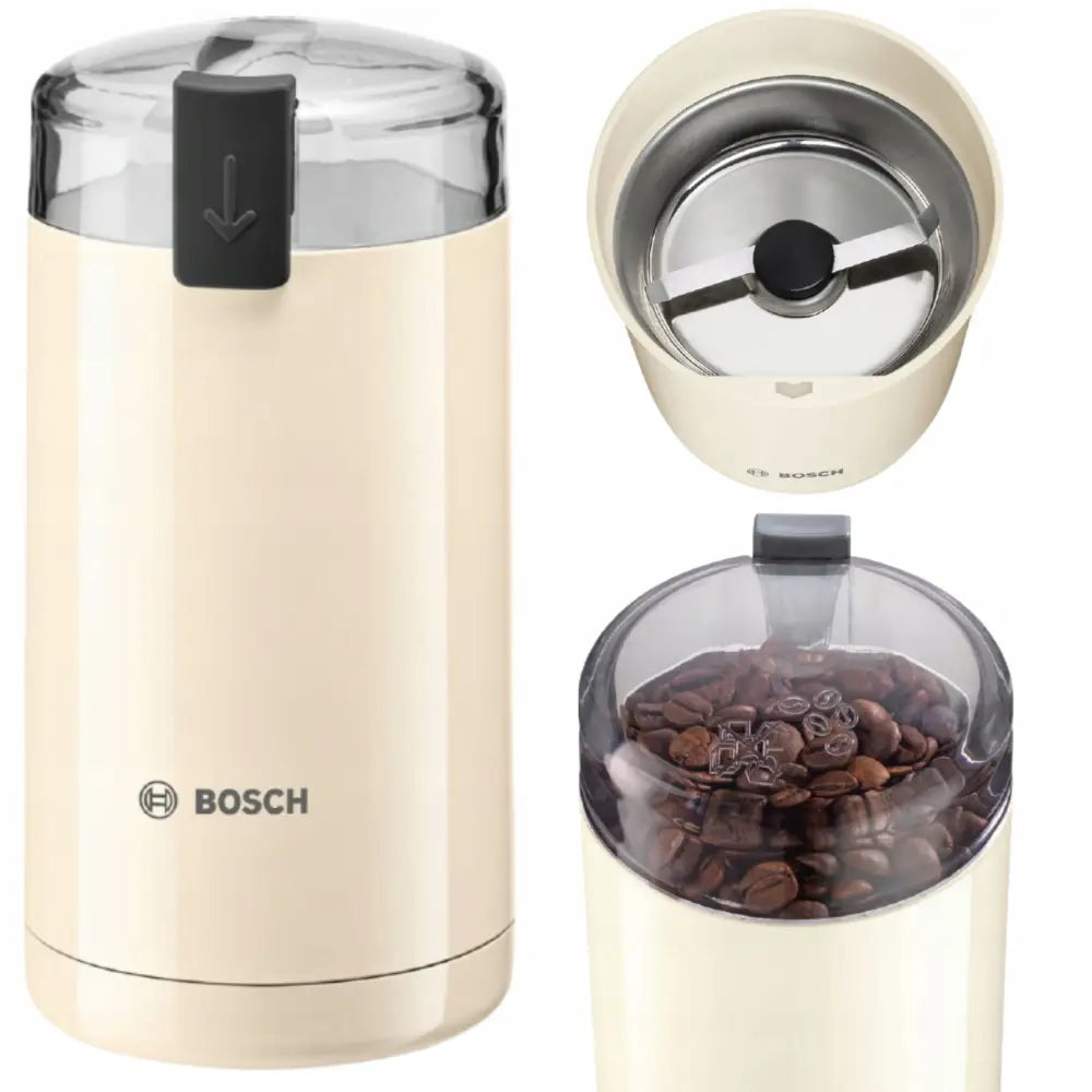 Bosch elektrisk kaffekvern i kremhvit plast, sett ovenfra med kaffebønner og knivblad synlig under lokket.