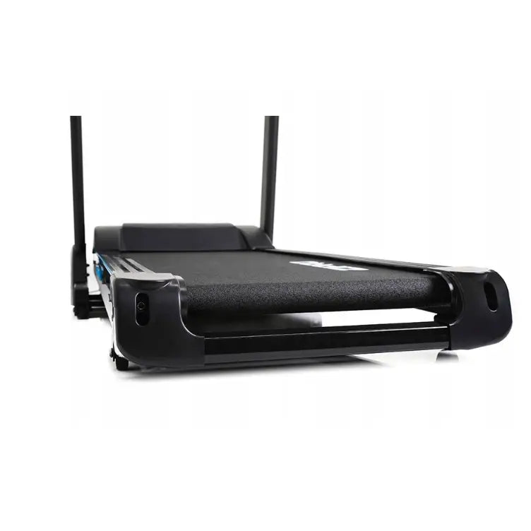 Tredemølle Zipro Notus, lav frontvinkel som fremhever løpebånd og robuste plastdetaljer på sidene.