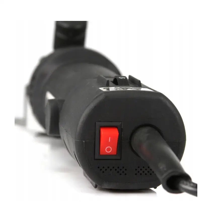 Kraftig klippemaskin for sau og storfe, bakfra med rød av/på-bryter og grov, matt overflate synlig.