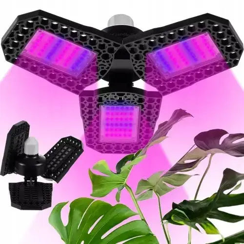 Lampe for plantevekst med tre justerbare LED-paneler, rosa-lilla lys over grønne planter.