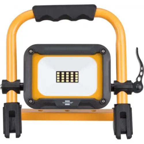 LED arbeidslampe JARO 1010 MA på gult stativ, frontvisning med svart håndtak og sidefester.