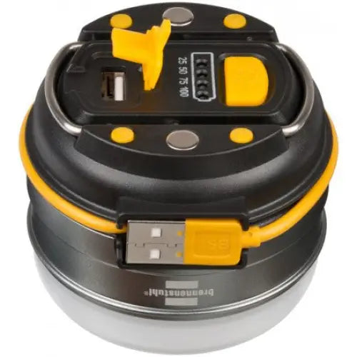 Lampe LED OLI, sett ovenfra med synlig USB-port, indikatorlamper og tilkoblet gul USB-kabel.