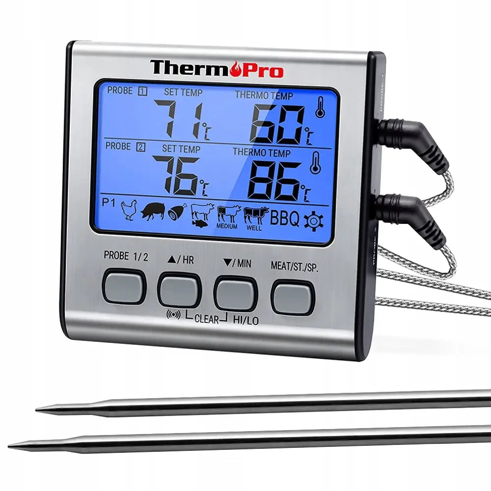 LCD-termometer for kjøtt, sølvfarget med blått display, viser to temperaturer og tilkoblede metallsonder.