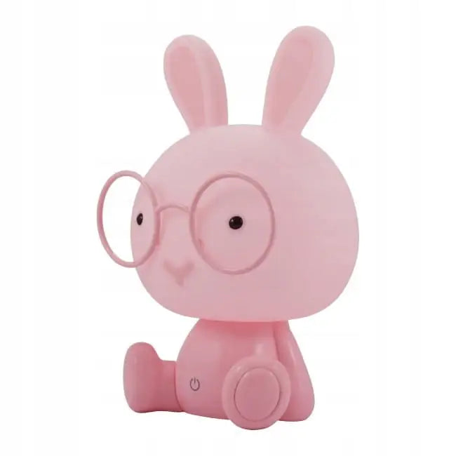 LED nattlampe formet som rosa kanin med store briller og av/på-knapp, sett fra skrå vinkel.