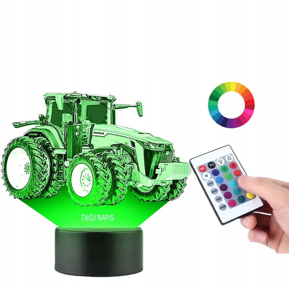 LED-skrivebordslampe formet som grønn John Deere traktor, sort sokkel, fjernkontroll og fargesirkel.