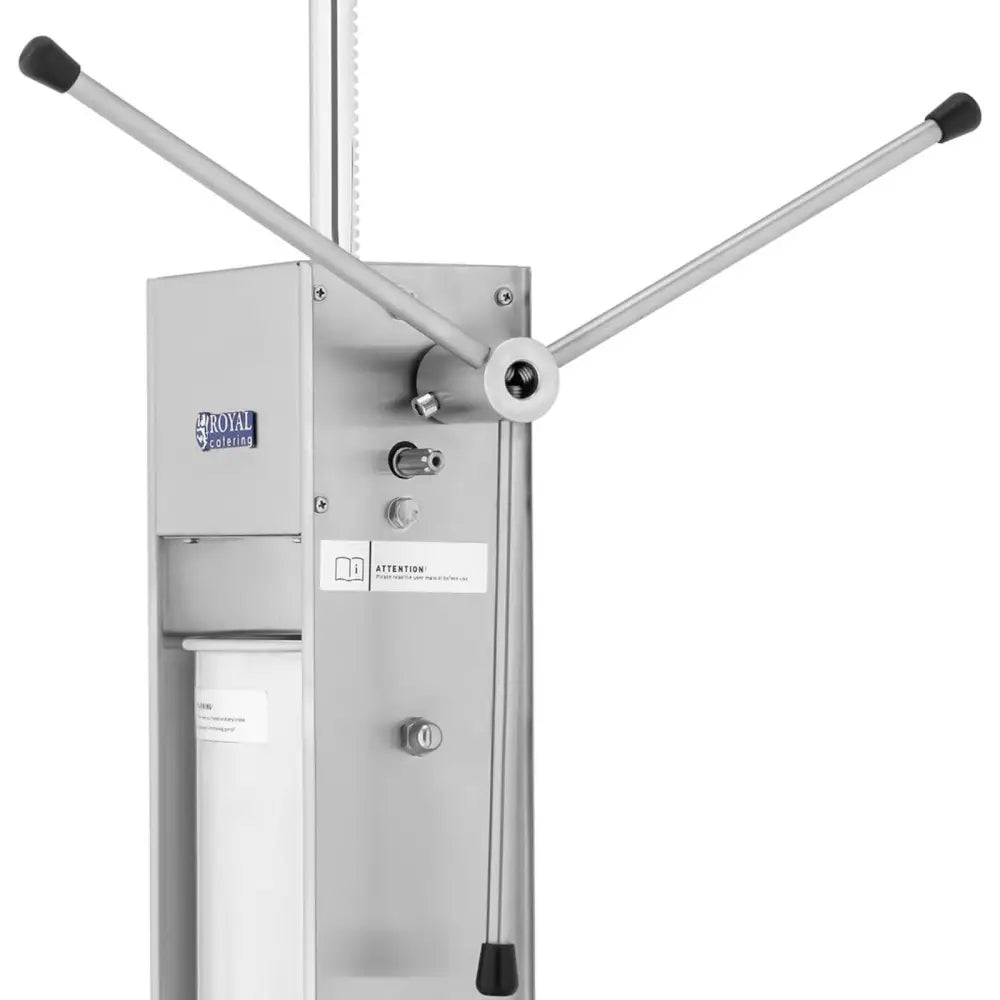 Maskinutstyr for dosering og steking av churros, skrå sidevisning med brytere og svarte håndtak synlig.