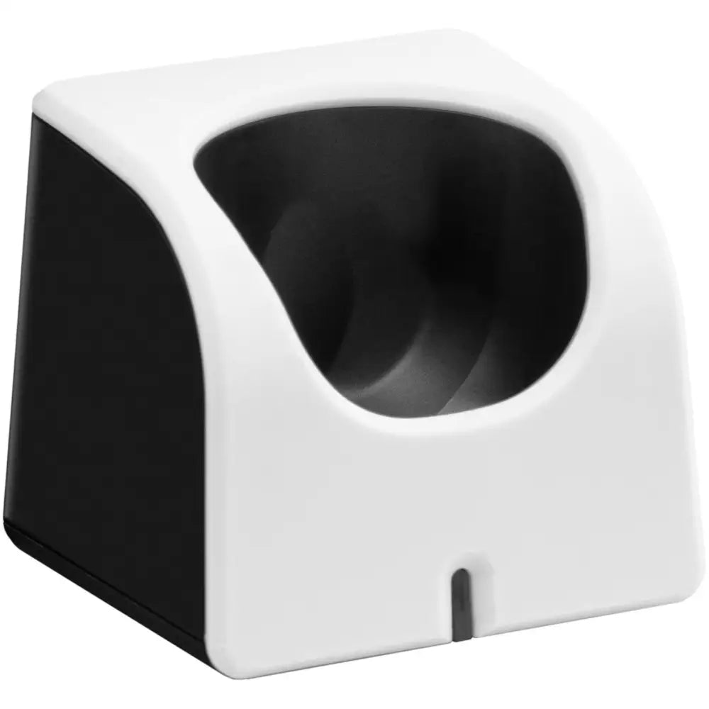 Ladestasjon til matvaretermometer, kvadratisk plastdesign med svart innside og synlig åpning foran.