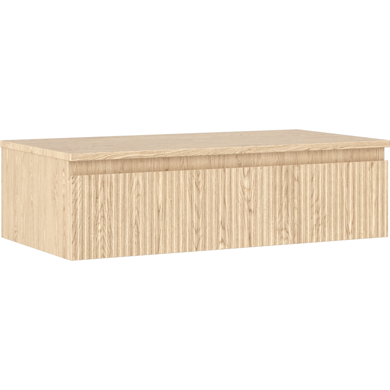 Servantskap 90 cm i lyst eiketre med riflet front, sett fra skrå vinkel uten synlige håndtak.