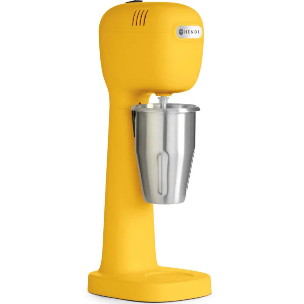 Gul elektrisk mikser for melkedrikker, skråvisning med blank metallbeholder og robust base.