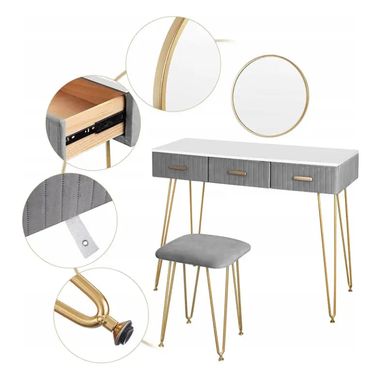 Moderne sminkebord i grått, nærbilde av gullfargede ben, håndtak og struktur på materialet.