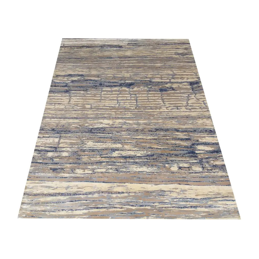 Moderne teppe Milas 200 x 290 cm, sett ovenfra med abstrakt beige, grå og blå strukturert overflate.
