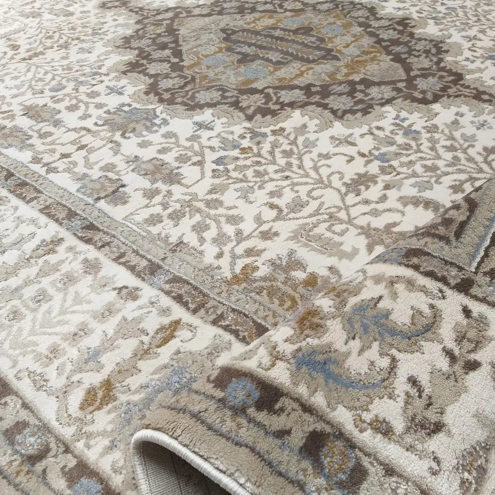 Modernt Tepe Milas Soft Shrink PRL 02A-KK teppe, orientalsk mønster, beige og brunt, hjørne brettet opp.