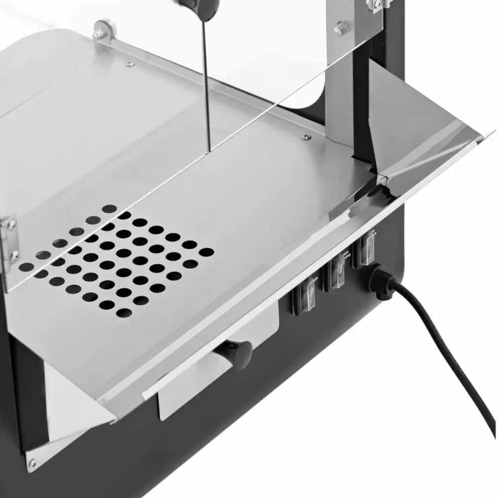 Nachos maskinvarmer, nærbilde av kontrollpanel og avrundet dryppbrett med perforert metallflate.