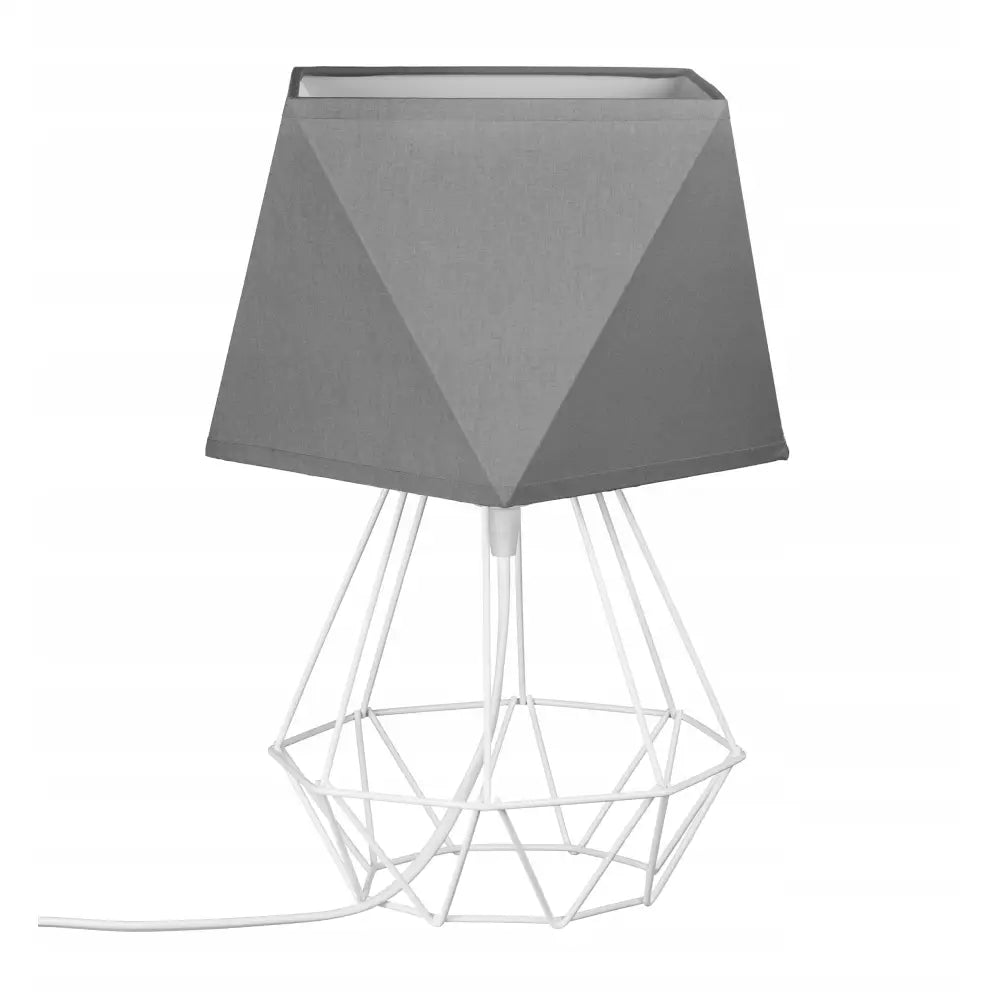 Nattlampe Loft med diamantformet grå trådskjerm og hvit metallfot, ledning synlig nederst til venstre.