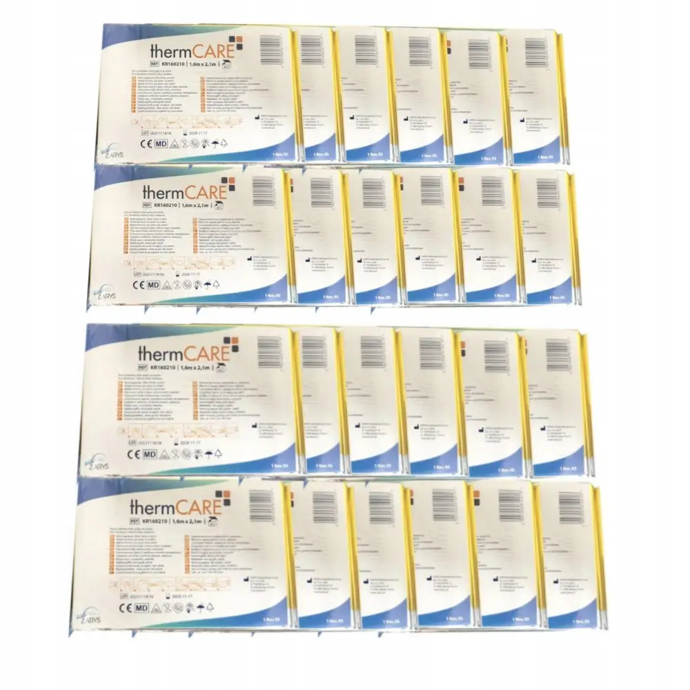 Nødpledd termisk livsfolie i enkeltpakkede poser merket "thermCARE", sett ovenfra i grupper.