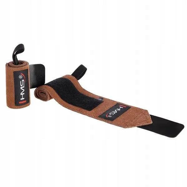 Onx04 stabilisator for håndleddet i brun lær med svarte detaljer, én utrullet og én sammenrullet på hvit bakgrunn.