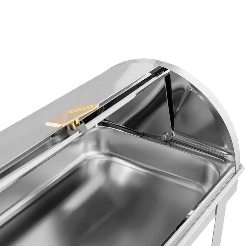 Oppvarmingskar GN 1/1 med avrundet lokk, gullfarget håndtak og blank overflate sett fra skrå vinkel.