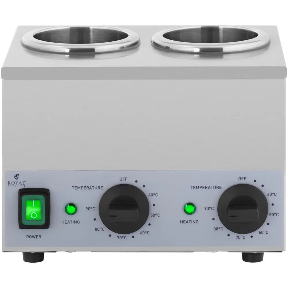 Oppvarmingsenhet for sauser, frontbilde med doble temperaturratt, to åpninger og synlig av/på-bryter.
