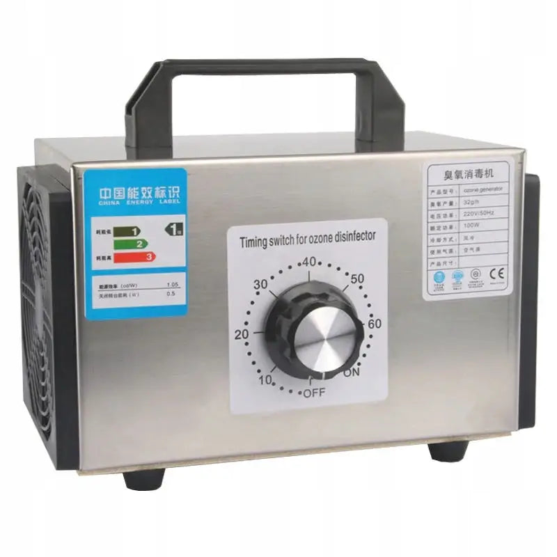 Ozongenerator i sølvfarget metall, sort bærehåndtak, dreieknapp med timer og synlige ventilasjonsgitter.