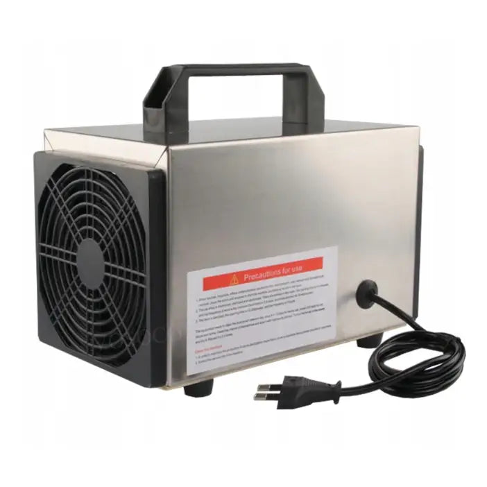 Ozongenerator med timer og filter, nærbilde av metallkabinett med sort håndtak, vifte og instruksjonsfelt.