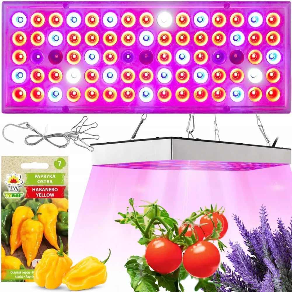 Plantevekstlampe panel, LED-lampe med røde, blå, hvite og lilla dioder, lyser over planter og frøpakke.