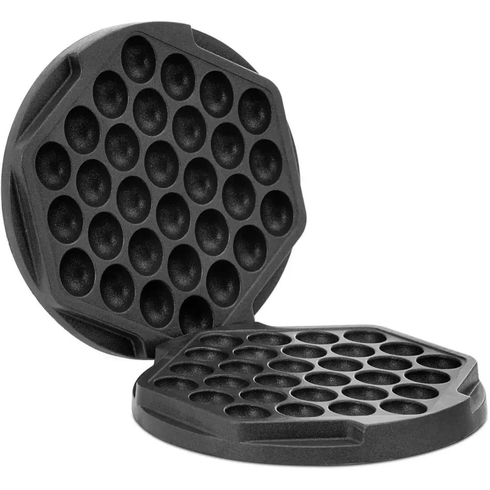 Plater for boblevaffeljern, svart støpejern med halvsirkelformede fordypninger sett åpent fra skrå vinkel.