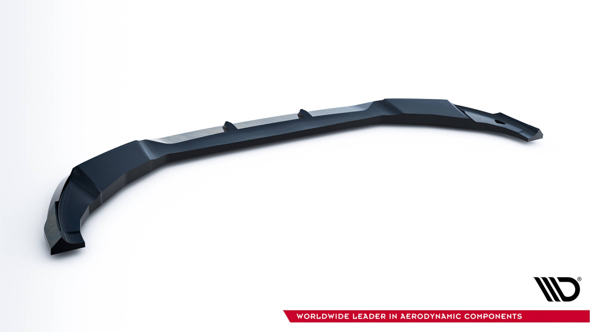 Front lip til BMW X4M F98 Facelift i svart plast, sett skrått ovenfra mot hvit bakgrunn.