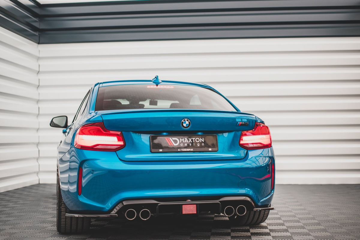 Nærbilde av bildel til BMW M2 F87, alternativ visning